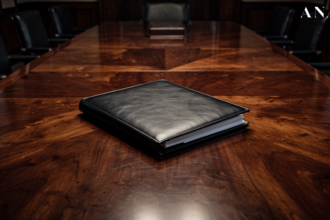A leather dossier on a mahogany table representing the sovereign family office and its absolute financial secrecy.